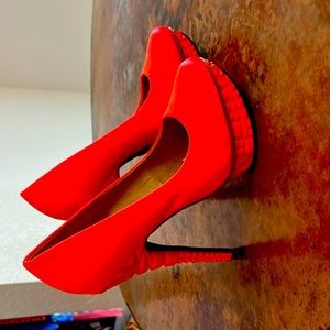 Orange heels with molded decorative platform and heels